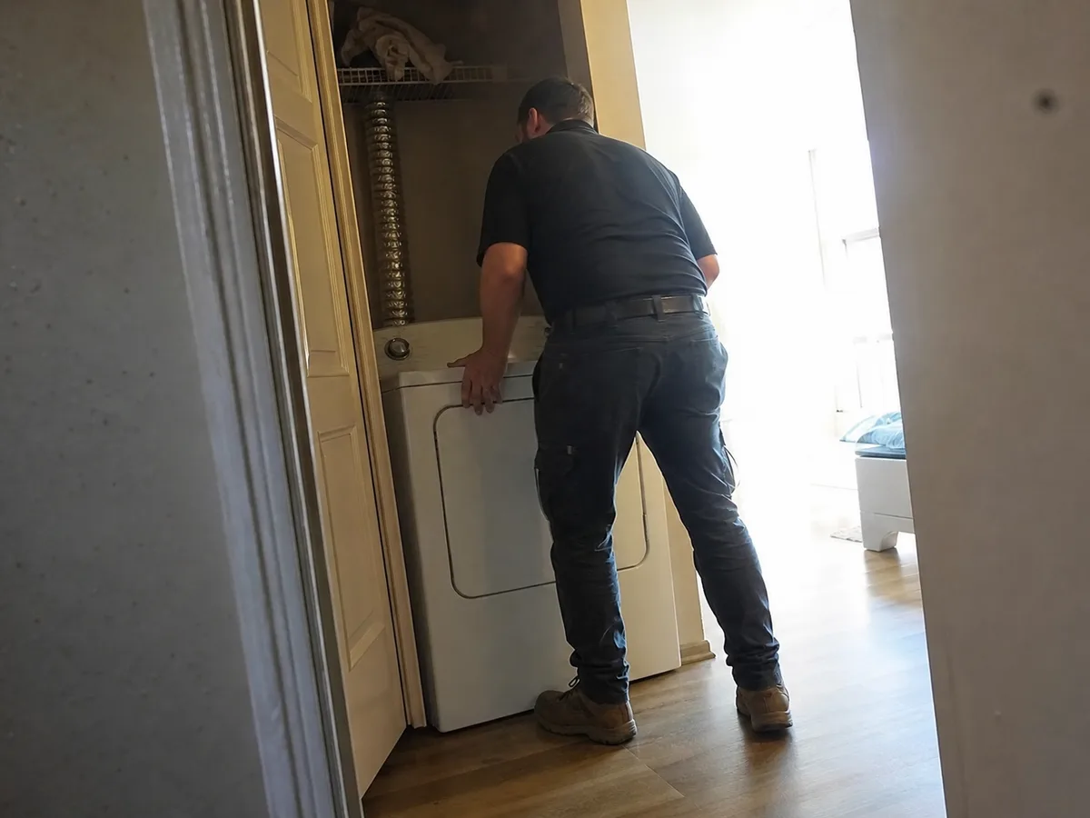 dryer vent cleaning technician on the job in Thousand Oaks, CA